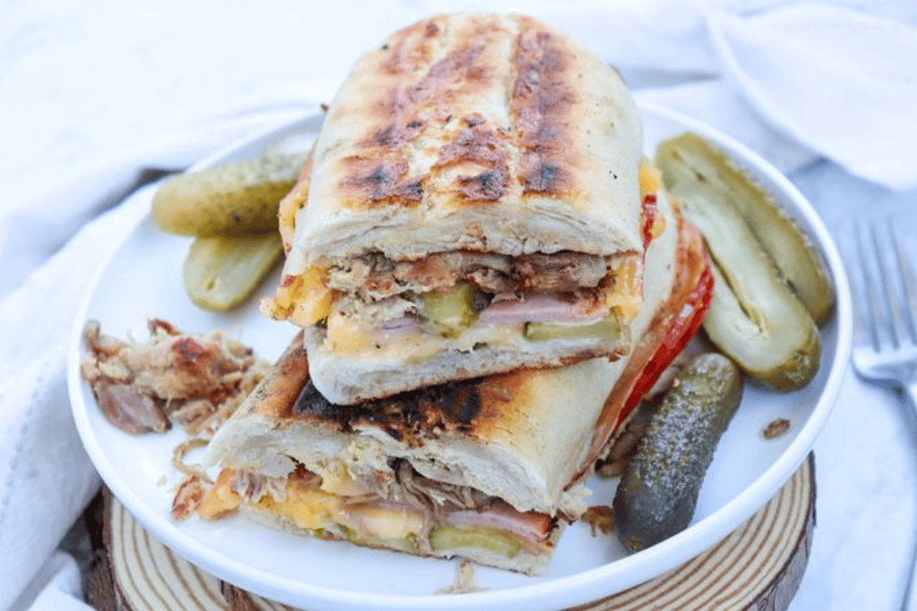 Slices of Cuban sandwich on a plate