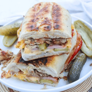 Slices of Cuban sandwich on a plate