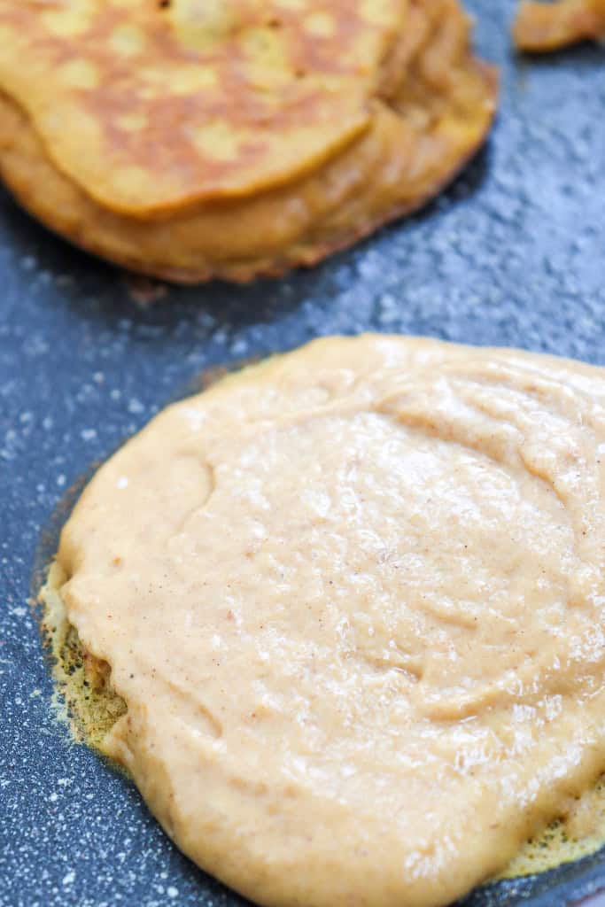Cooking pumpkin pancakes in griddle