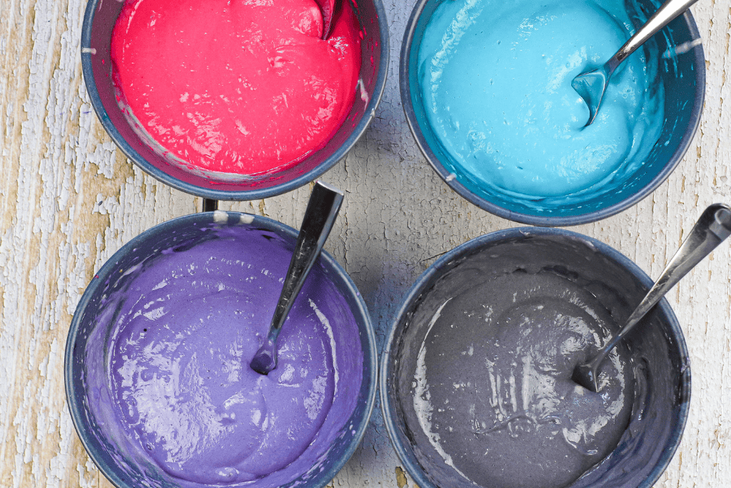 dividing the batter and adding the food coloring
