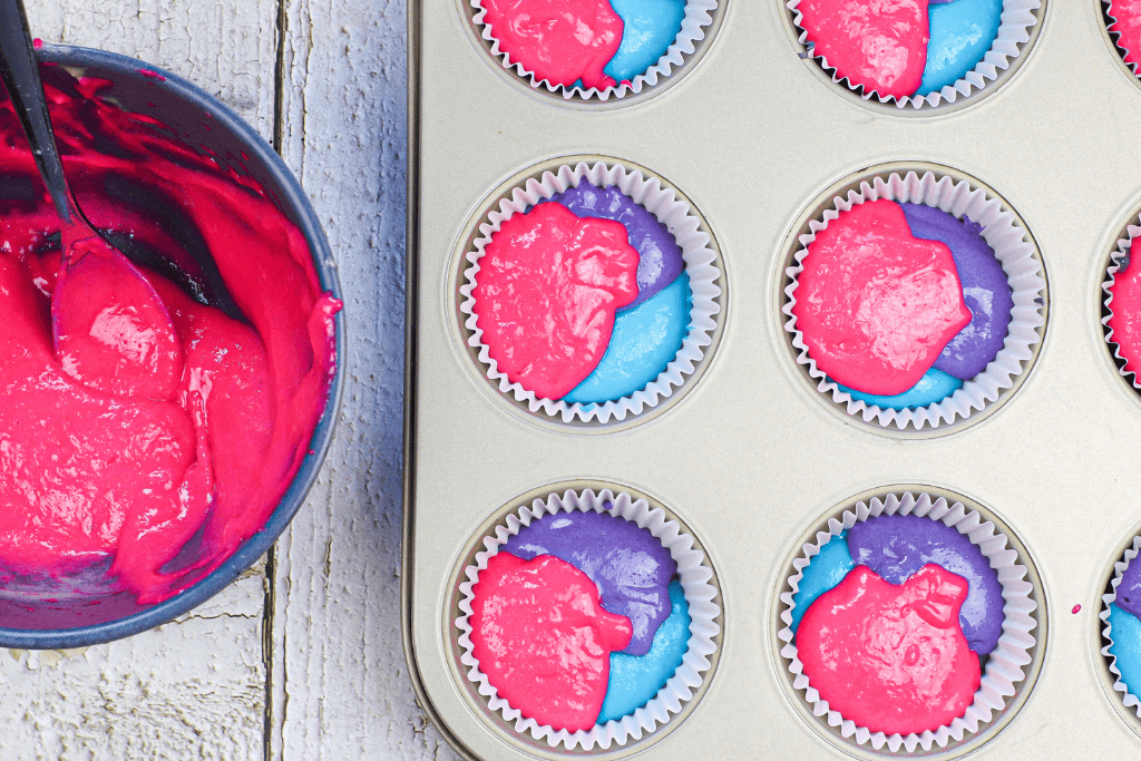 filling the lined muffin tin