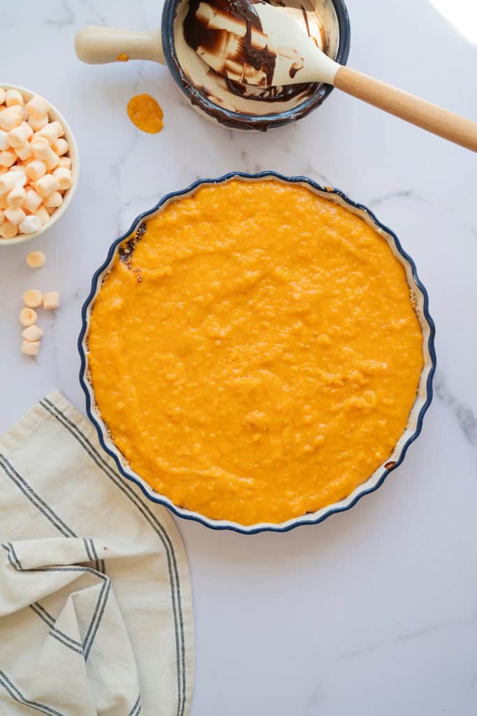sweet potato filling spread over the chocolate layer