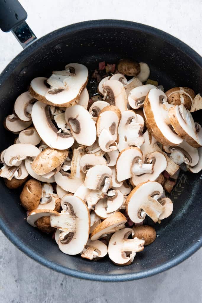 mushrooms added onto pan