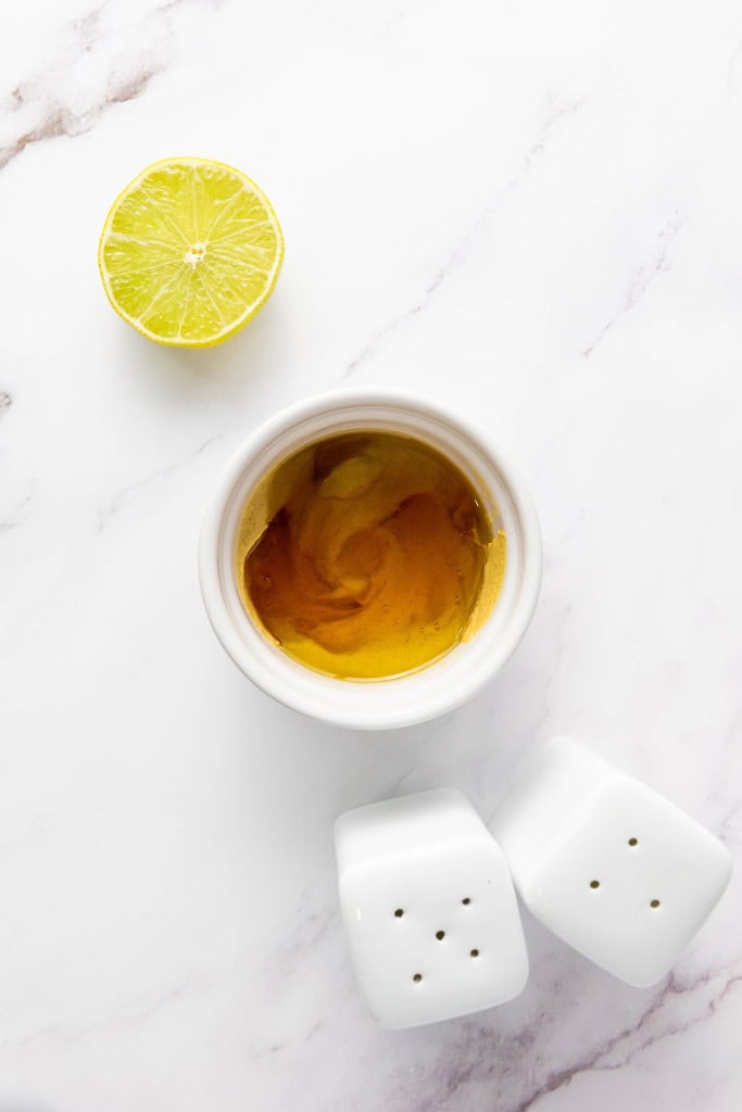 mixing together ingredients for the honey mustard dressing