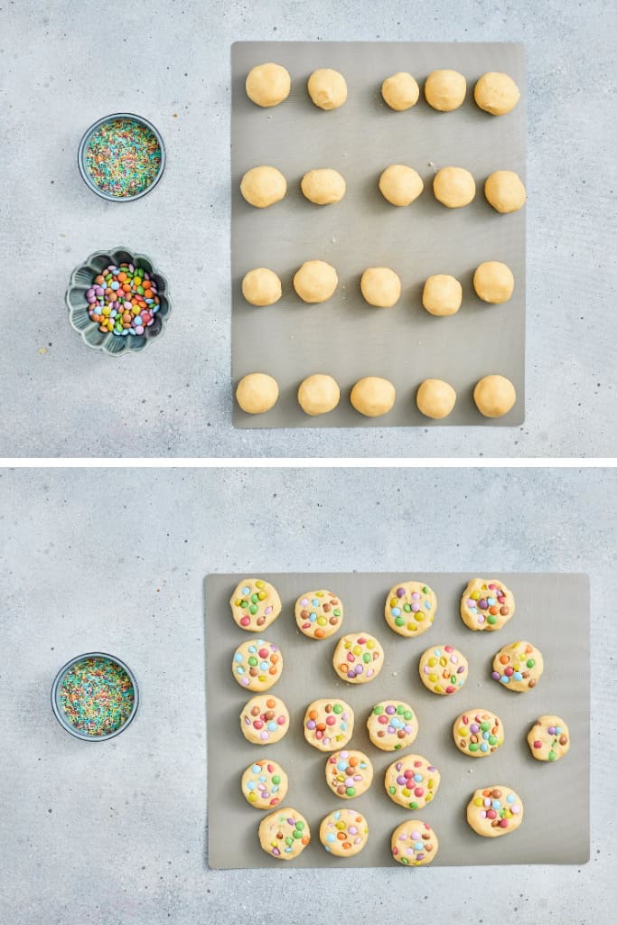 cookie dough shaped into balls then topped with candy coated chocolates, ready to bake