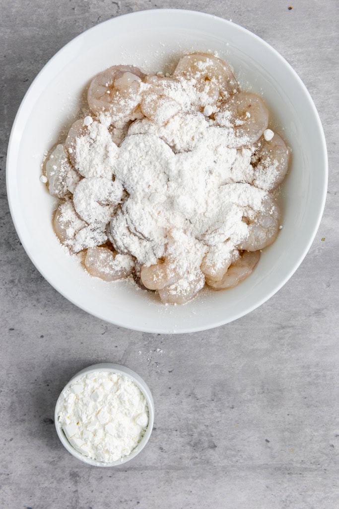 coat shrimp with flour and cornstarch mixture