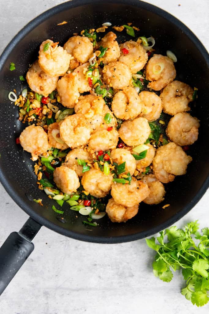 tossed shrimp with aromatics topped with crushed peppercorns